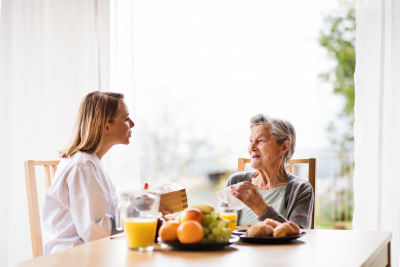 caregiver and elder woman during home visit